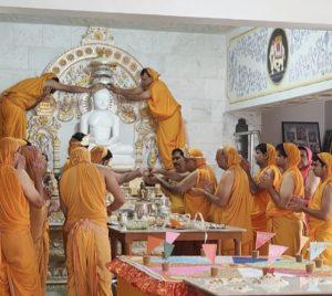 Dhanbad News: ध्वजारोहण के साथ जैन समुदाय का पर्युषण पर्व शुरू